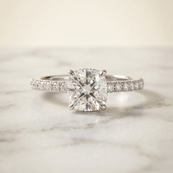 The Elliott Hidden Halo Pavé Cushion Cut Engagement Ring Setting in Platinum