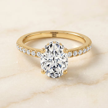 The Elliott Hidden Halo Pavé Oval Engagement Ring Setting in 18K Yellow Gold