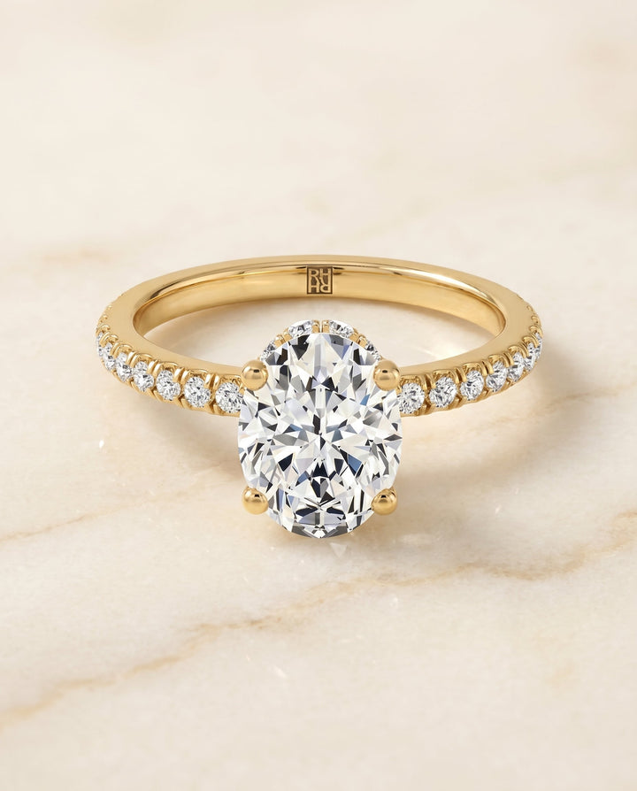 Elliott Select Hidden Halo Pavé Oval Lab Diamond Engagement Ring in 18K Yellow Gold, alternate angle | RockHer