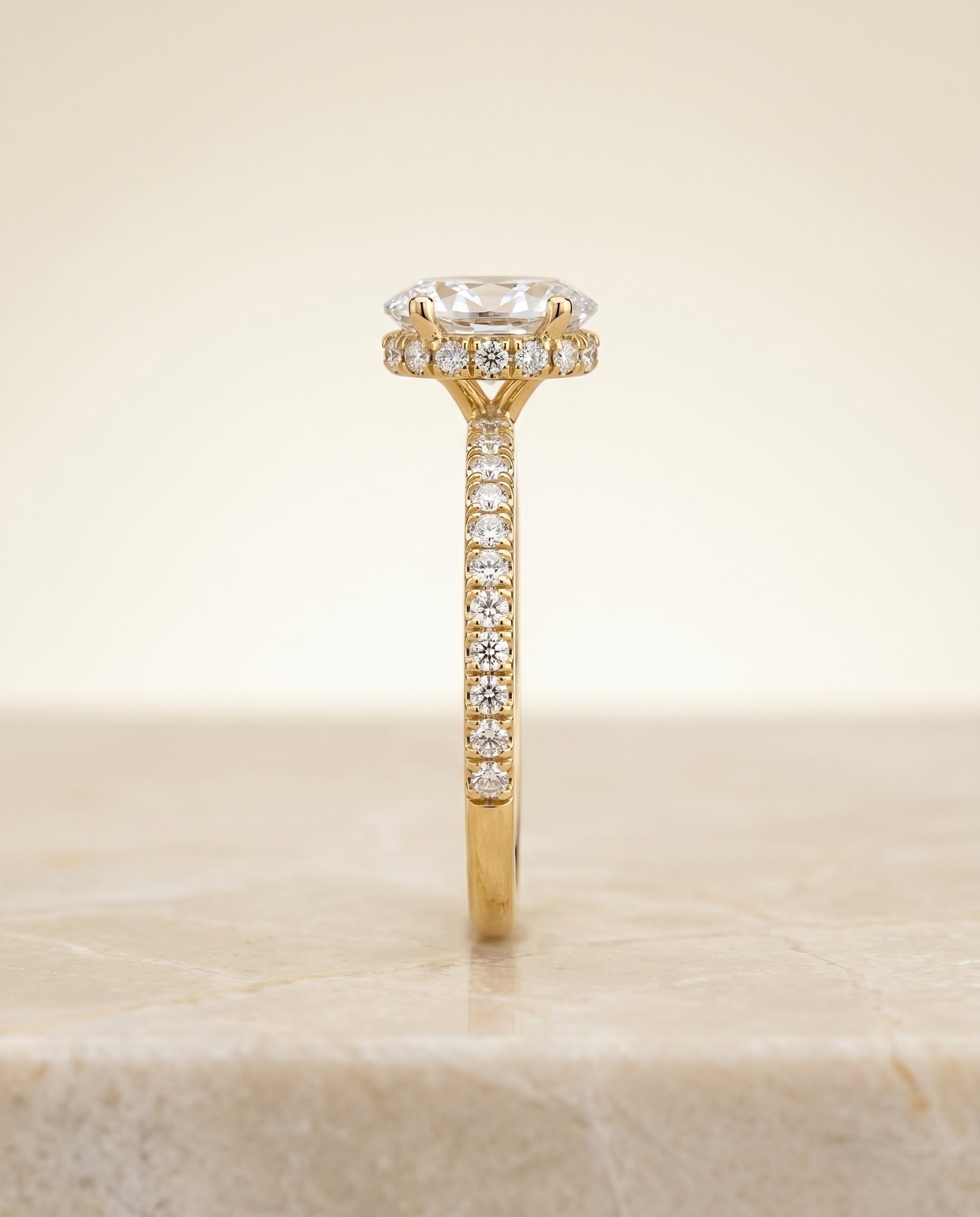 The Elliott setting for oval diamonds, made to order in 18K Yellow Gold | RockHer