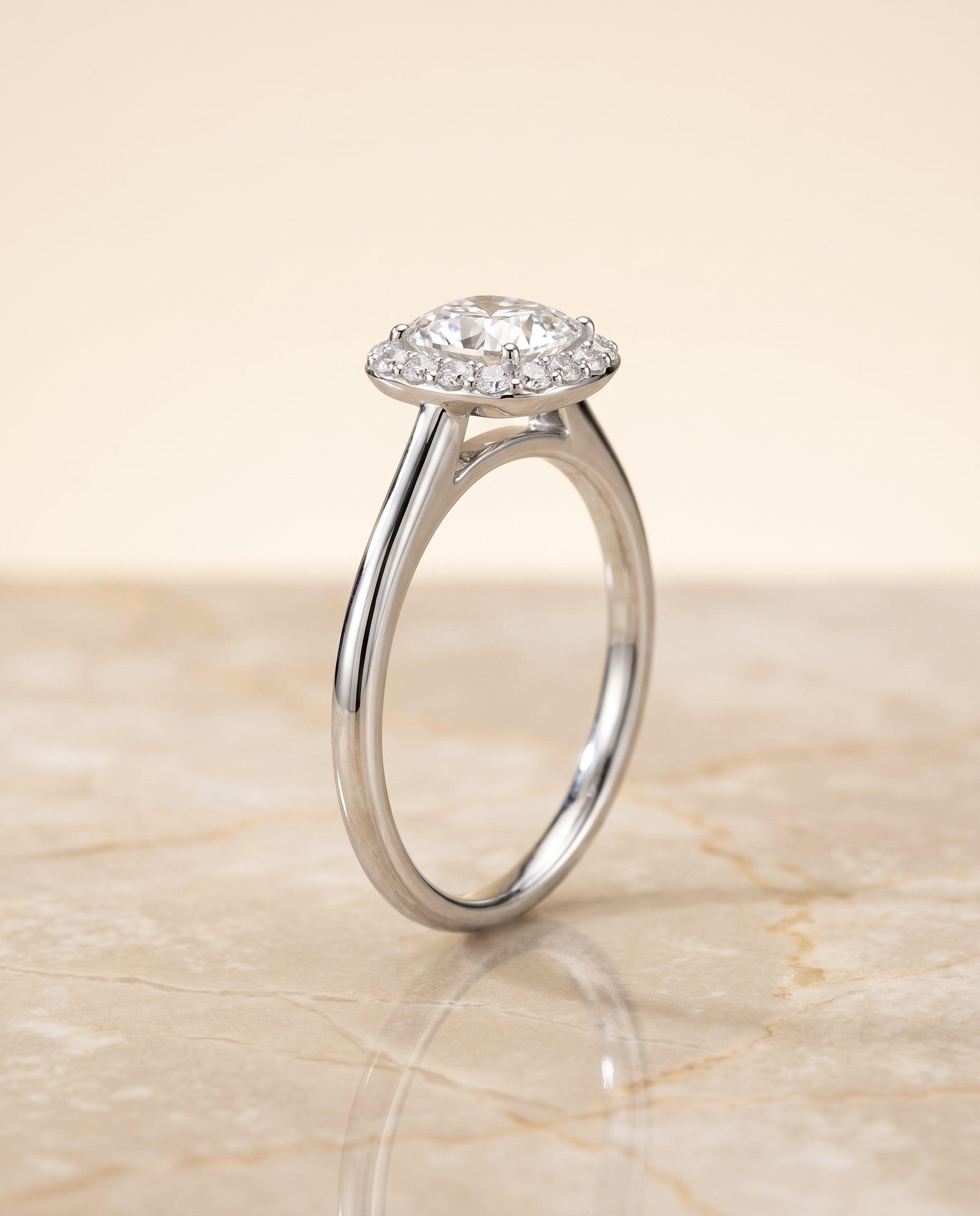 Classic Shared Prong Halo Cut styling on The Etta cushion engagement ring setting | RockHer
