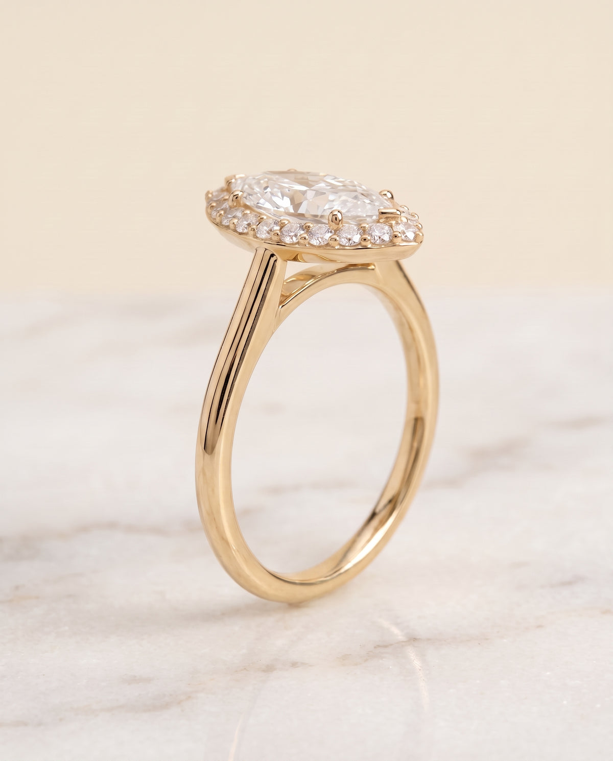 Classic Shared Prong Halo styling on The Etta marquise engagement ring setting | RockHer