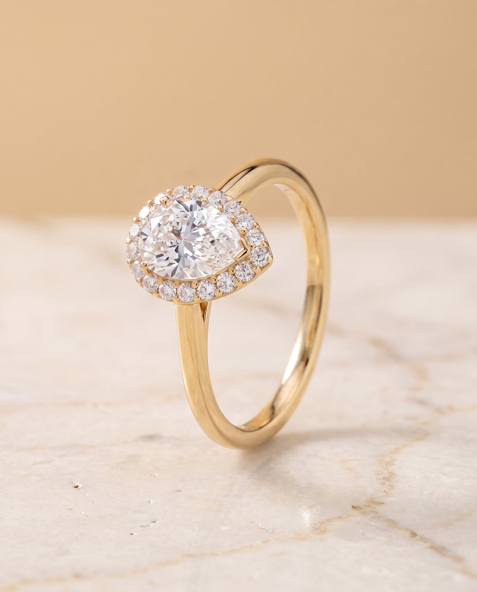 The Etta Classic Shared Prong Halo Pear Engagement Ring Setting in 18K Yellow Gold