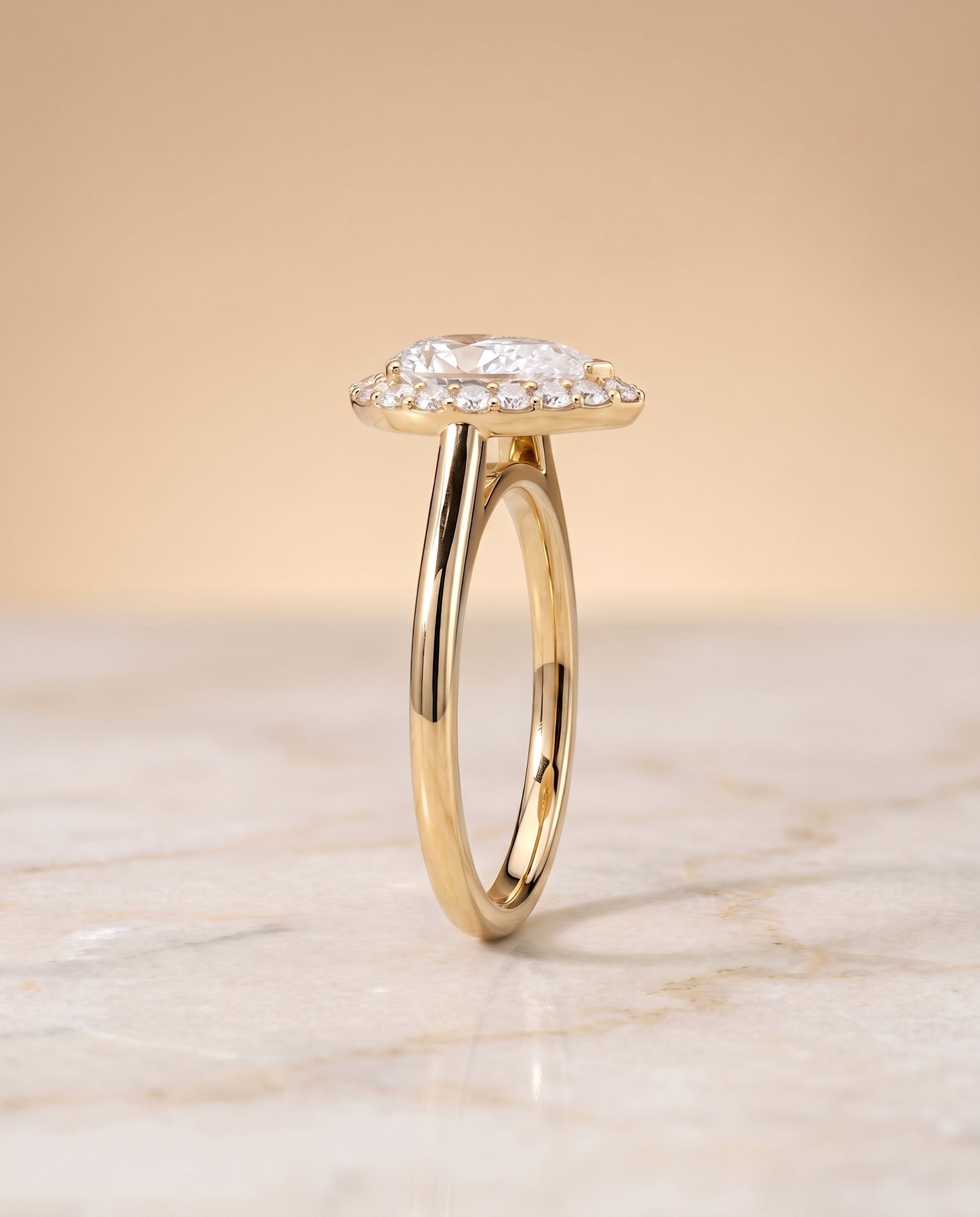 The Etta Classic Shared Prong Halo Pear Engagement Ring Setting in 18K Yellow Gold