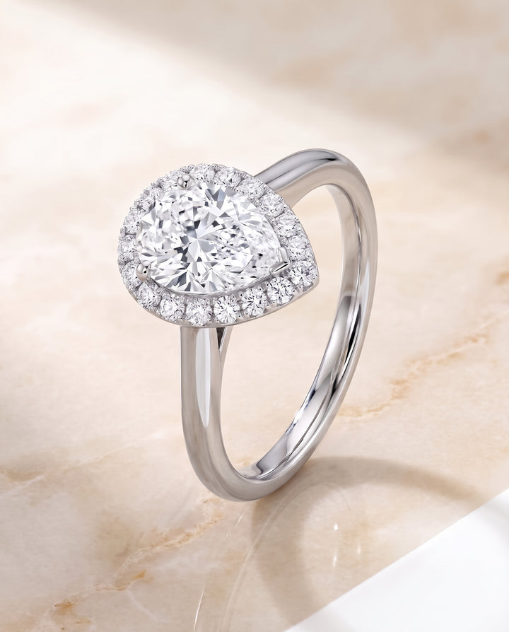 The Etta Classic Shared Prong Halo Pear Engagement Ring Setting in Platinum