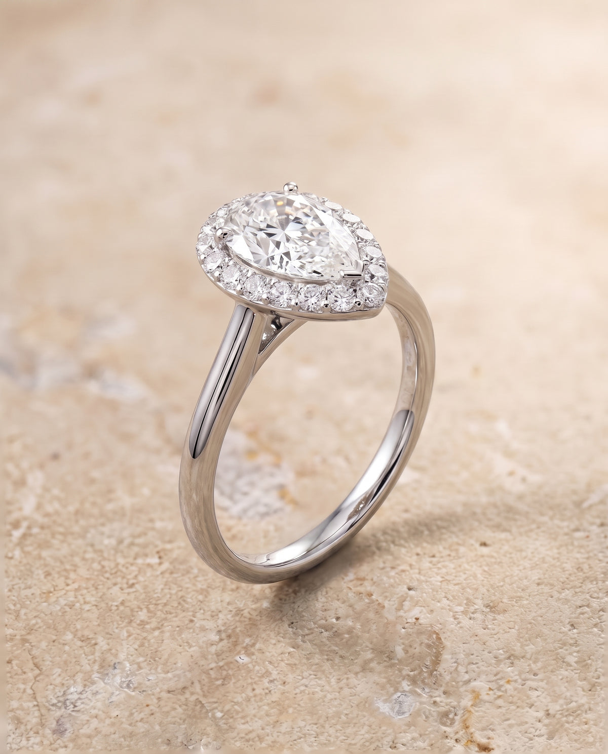 The Etta Classic Shared Prong Halo Pear Engagement Ring Setting in 18K White Gold