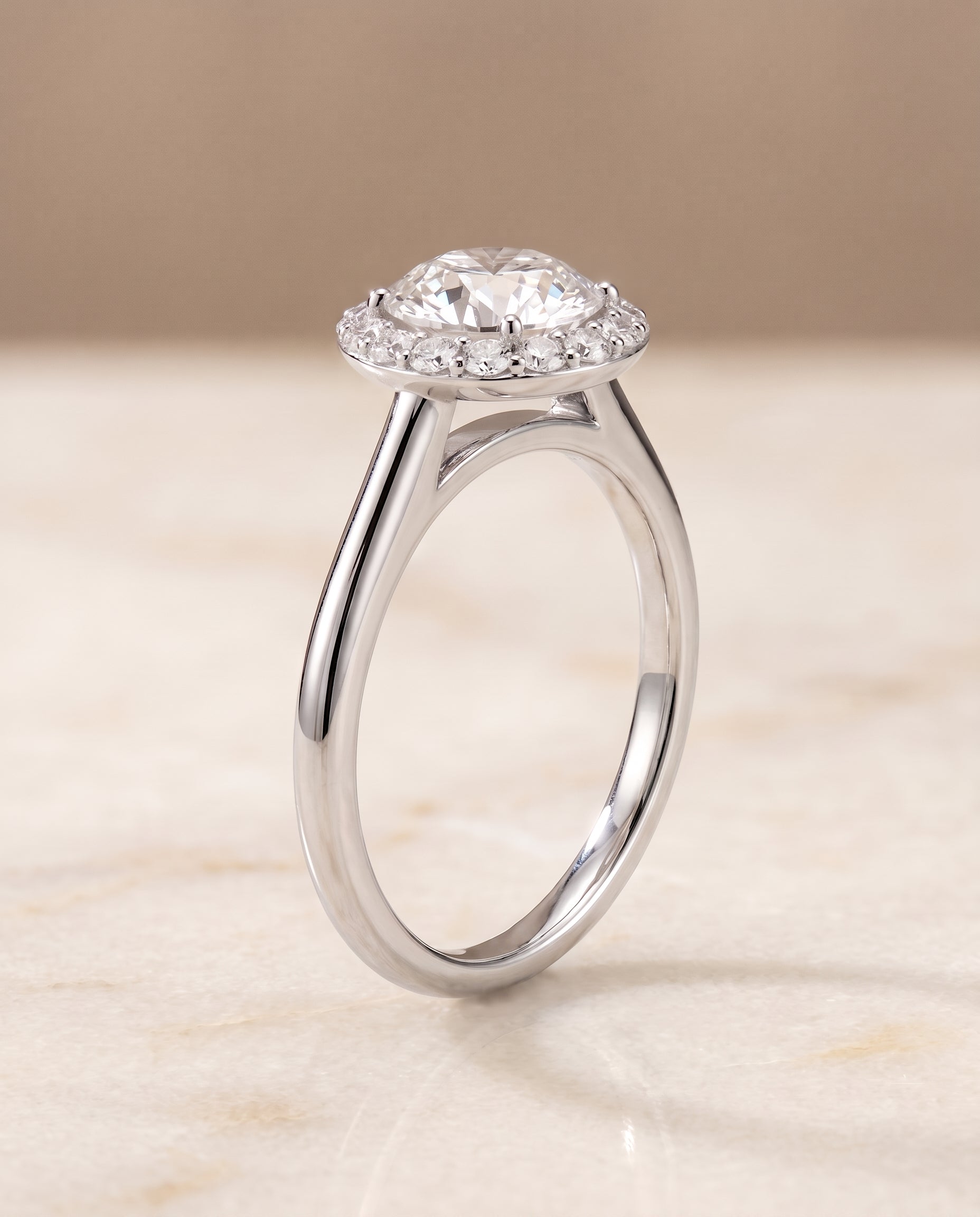Classic Shared Prong Halo styling on The Etta round engagement ring setting | RockHer