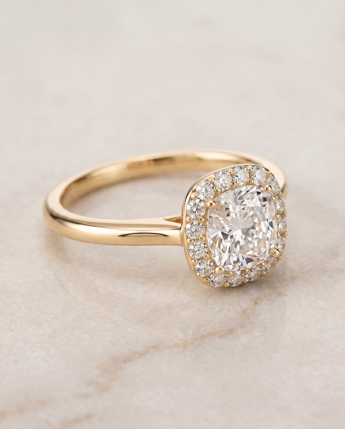 Etta Select Halo Cushion Cut Lab Diamond Engagement Ring in 18K Yellow Gold, shown on hand, angled | RockHer