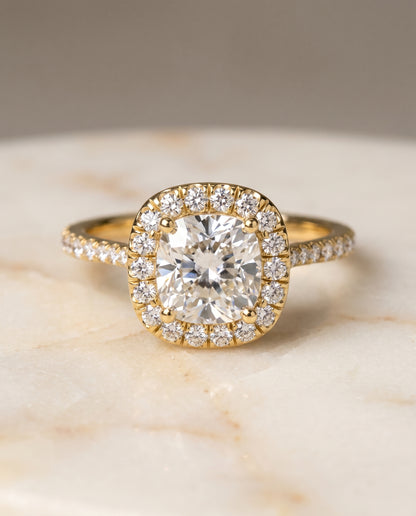 The Everly Classic Shared Prong Halo Cushion Cut Engagement Ring Setting in 18K Yellow Gold