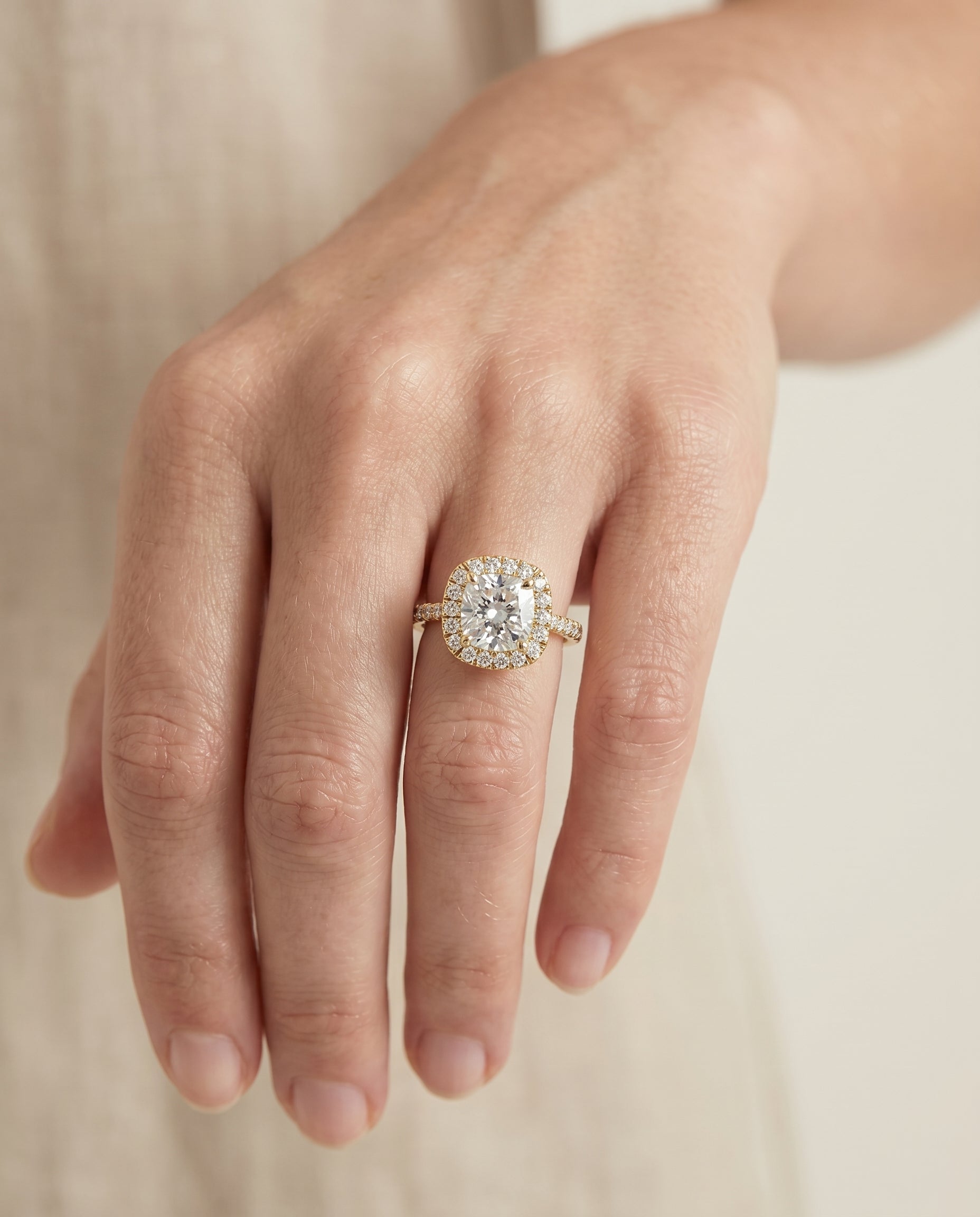 The Everly engagement ring setting in 18K Yellow Gold, classic shared prong halo cut design | RockHer