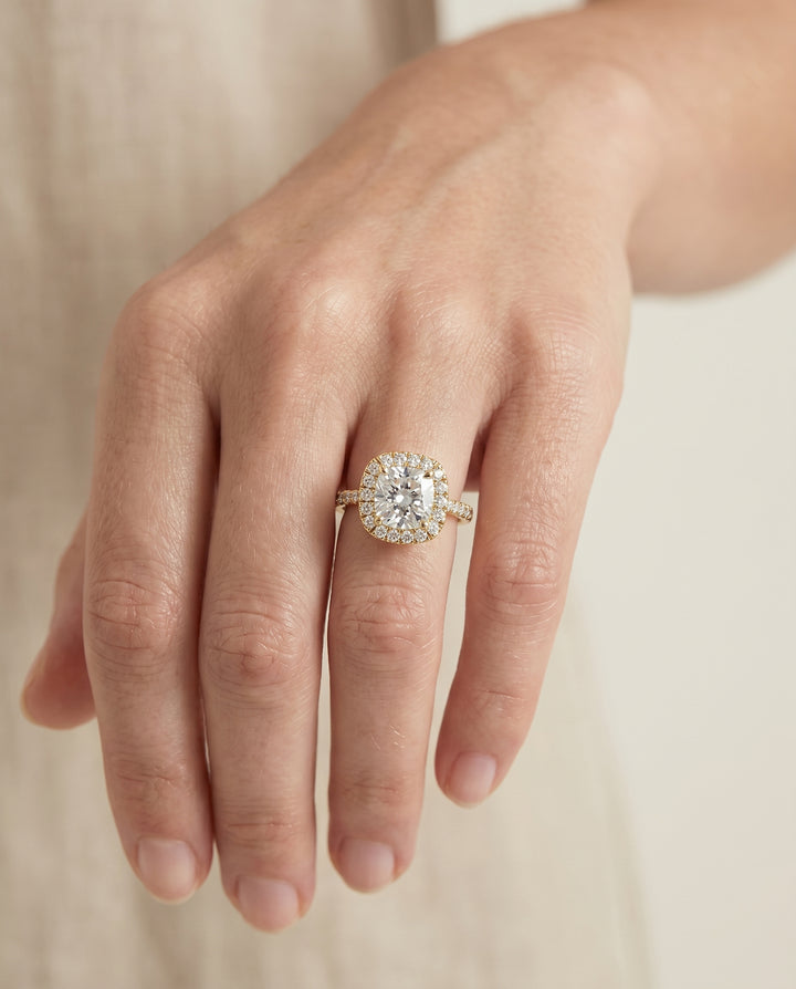 The Everly Classic Shared Prong Halo Cushion Cut Engagement Ring Setting in 18K Yellow Gold