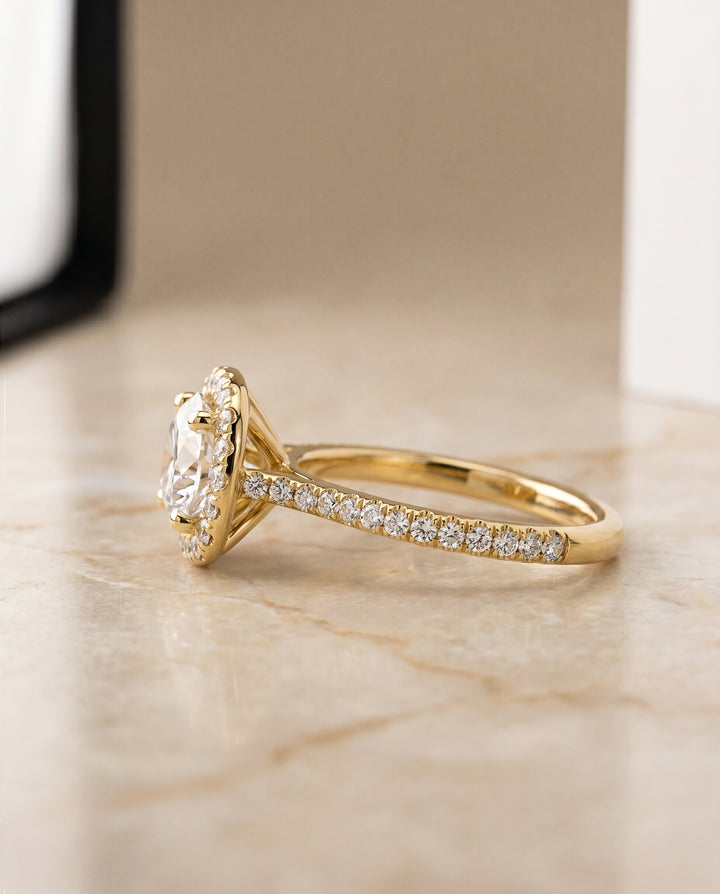 The Everly Classic Shared Prong Halo Round Engagement Ring Setting in 18K Yellow Gold