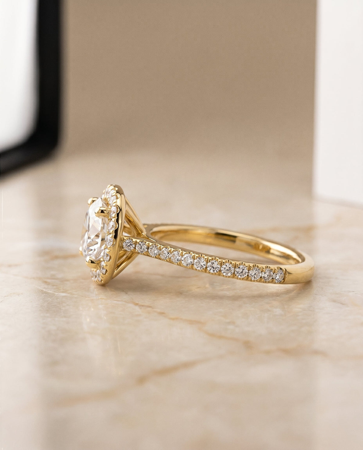 Everly Select Halo Round Lab Diamond Engagement Ring in 18K Yellow Gold, side view | RockHer