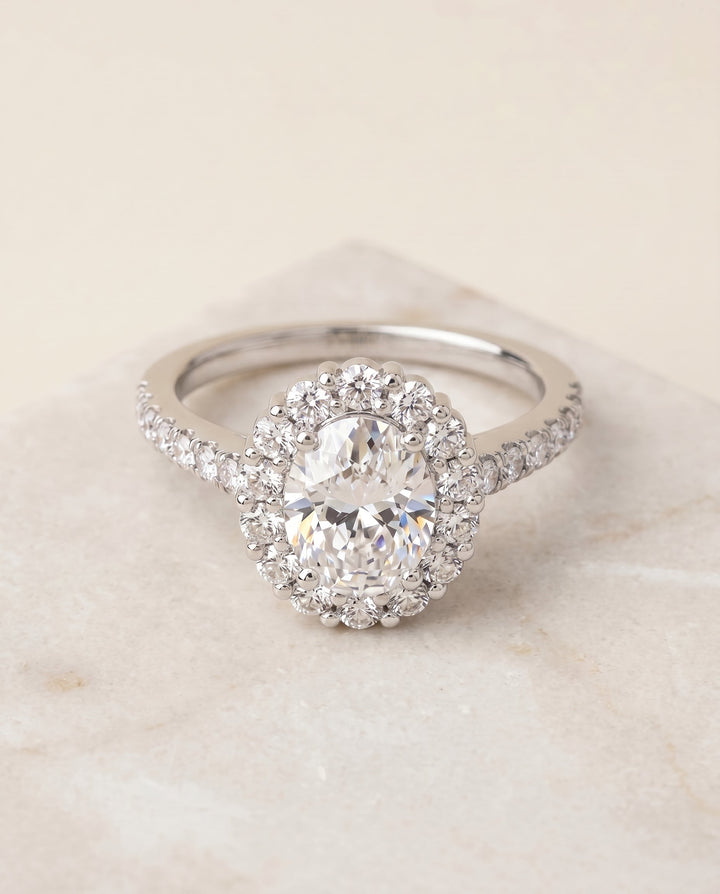Fiona Select Halo Oval Lab Diamond Engagement Ring in 18K White Gold, shown on hand, angled | RockHer