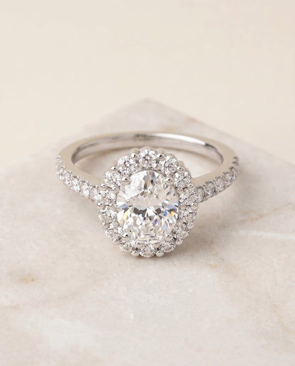 Fiona Select Halo Oval Lab Diamond Engagement Ring in Platinum, shown on hand, angled | RockHer