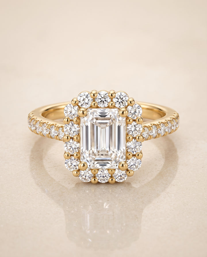 The Fiona Shared Prong Halo Emerald Cut Engagement Ring Setting in 18K Yellow Gold
