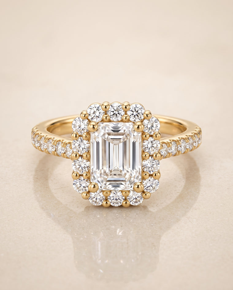 The Fiona Shared Prong Halo Emerald Cut Engagement Ring Setting in 18K Yellow Gold