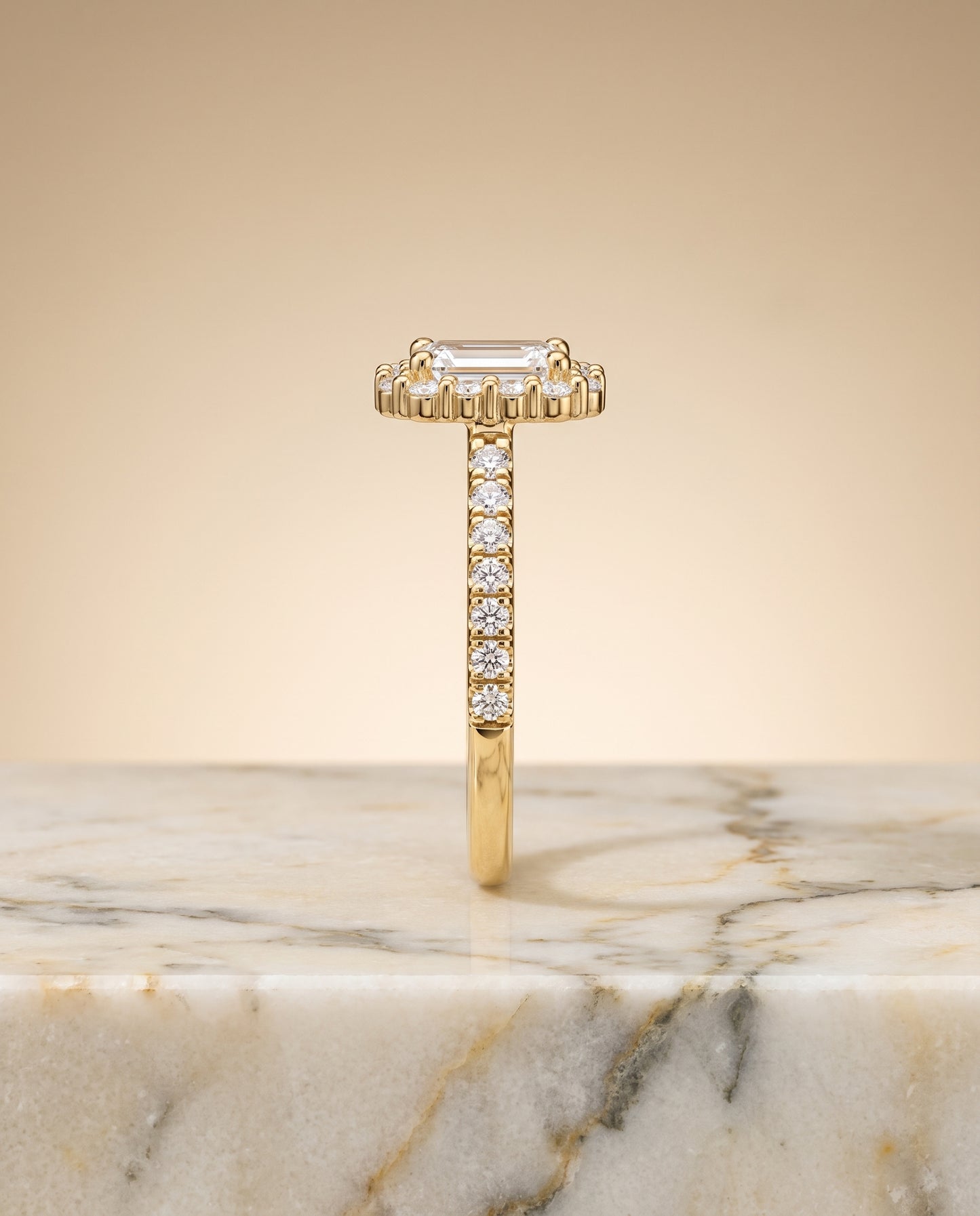 The Fiona Shared Prong Halo Emerald Cut Engagement Ring Setting in 18K Yellow Gold