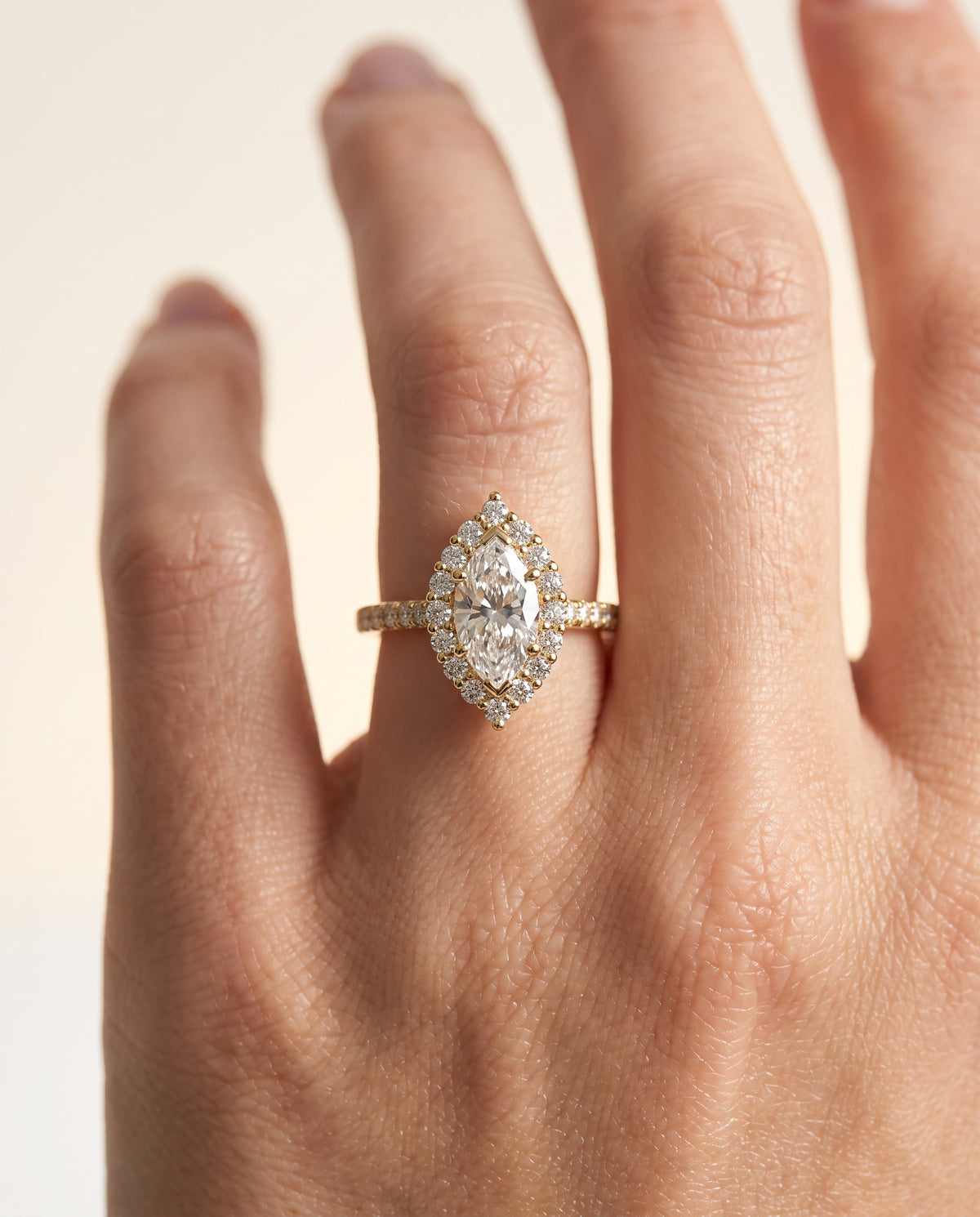 The Fiona engagement ring setting in 18K Yellow Gold, shared prong halo design | RockHer