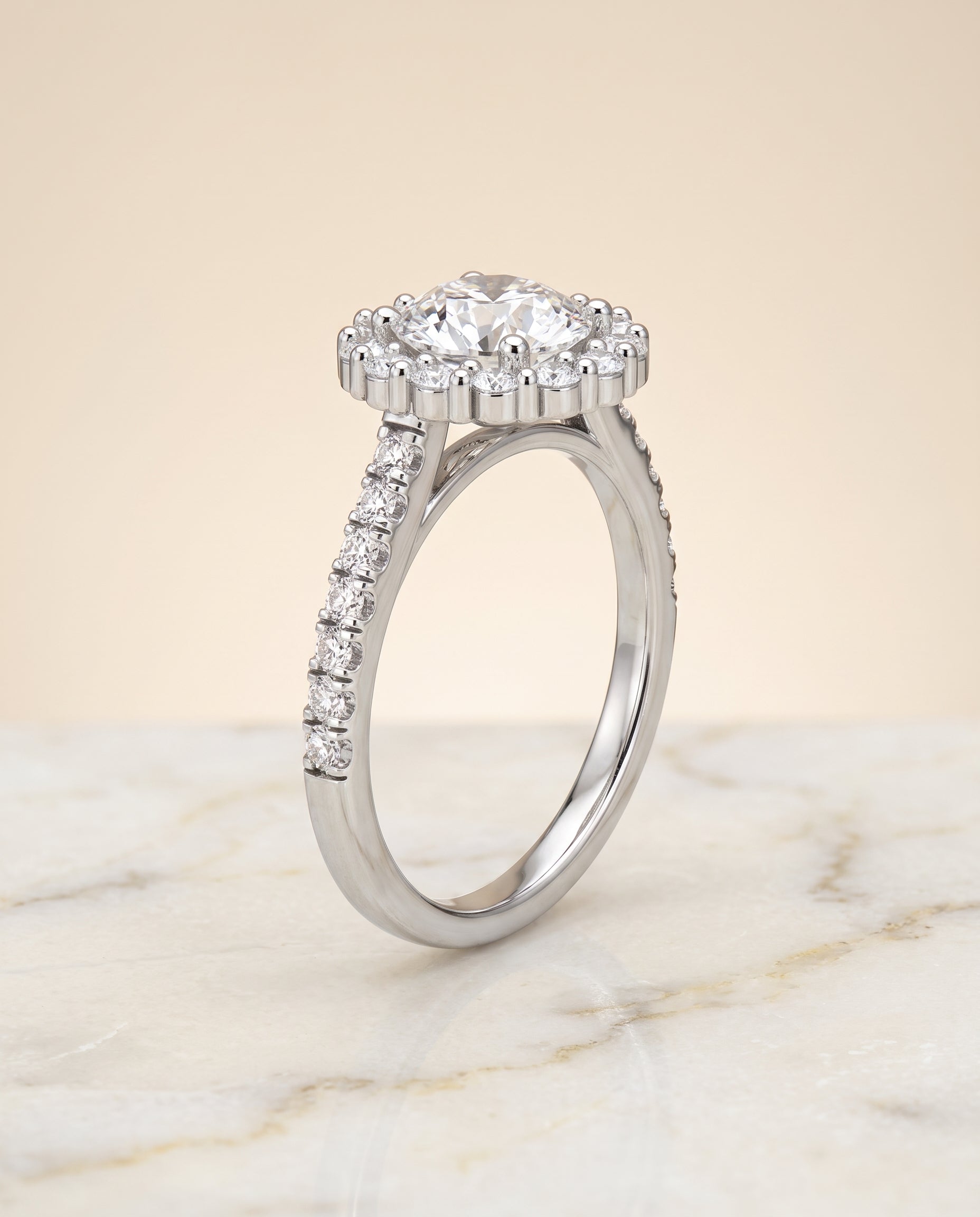 Shared Prong Halo styling on The Fiona round engagement ring setting | RockHer