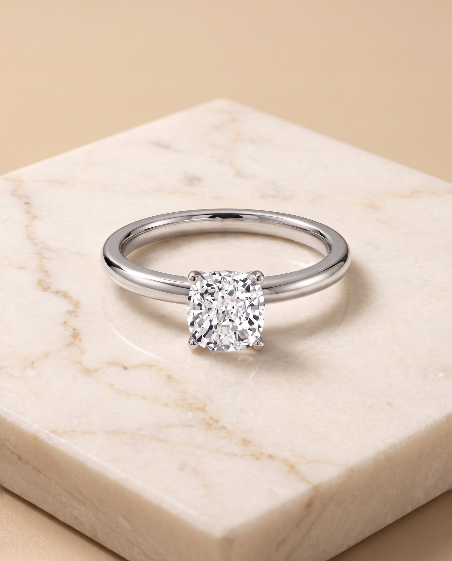 The Floria Comfort Fit Claw Prong Solitaire Cushion Cut Engagement Ring Setting in 18K White Gold