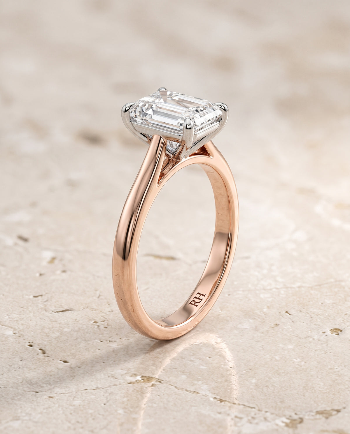 The Floria Comfort Fit Claw Prong Solitaire Emerald Cut Engagement Ring Setting in 14K Rose Gold