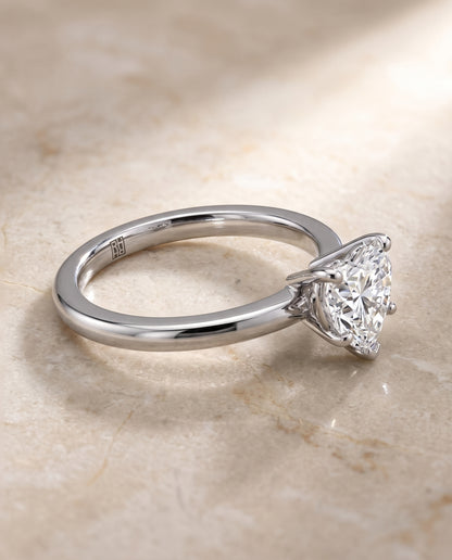 The Floria Comfort Fit Claw Prong Solitaire Heart Engagement Ring Setting in 18K White Gold