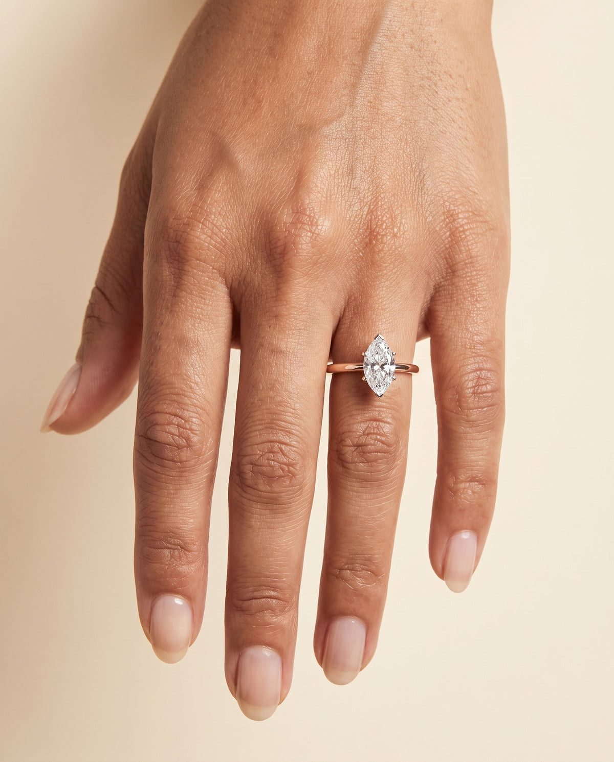 The Floria Comfort Fit Claw Prong Solitaire Marquise Engagement Ring Setting in 14K Rose Gold