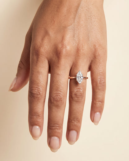 The Floria Comfort Fit Claw Prong Solitaire Marquise Engagement Ring Setting in 14K Rose Gold