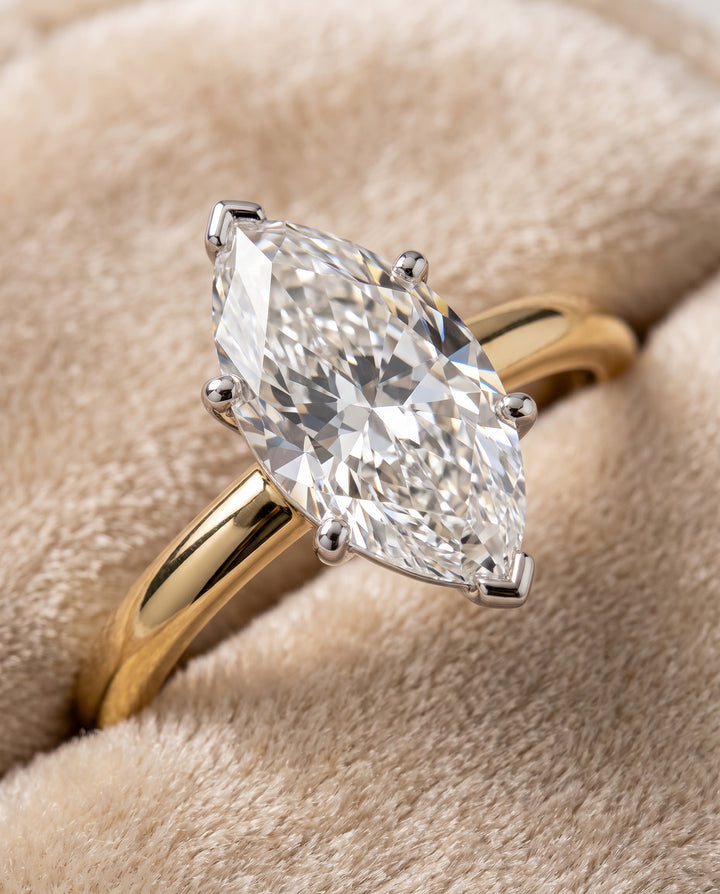 The Floria Comfort Fit Claw Prong Solitaire Marquise Engagement Ring Setting in 18K Yellow Gold