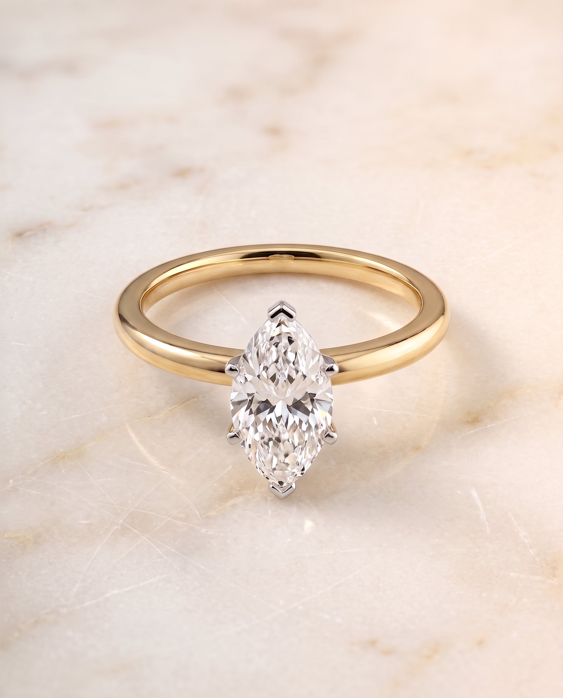 The Floria Comfort Fit Claw Prong Solitaire Marquise Engagement Ring Setting in 18K Yellow Gold