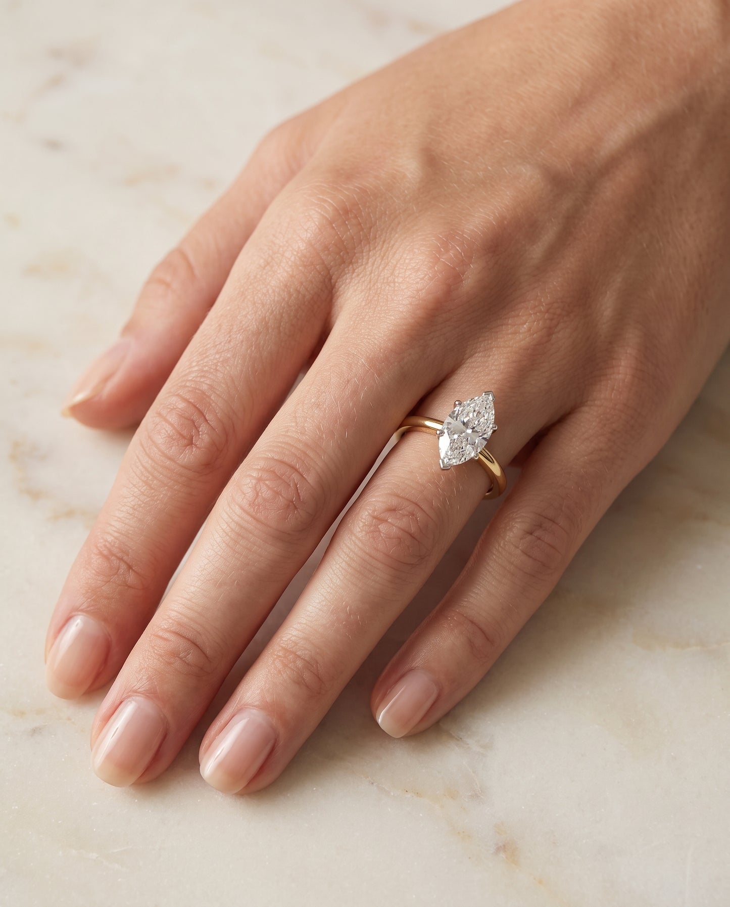 The Floria Comfort Fit Claw Prong Solitaire Marquise Engagement Ring Setting in 18K Yellow Gold