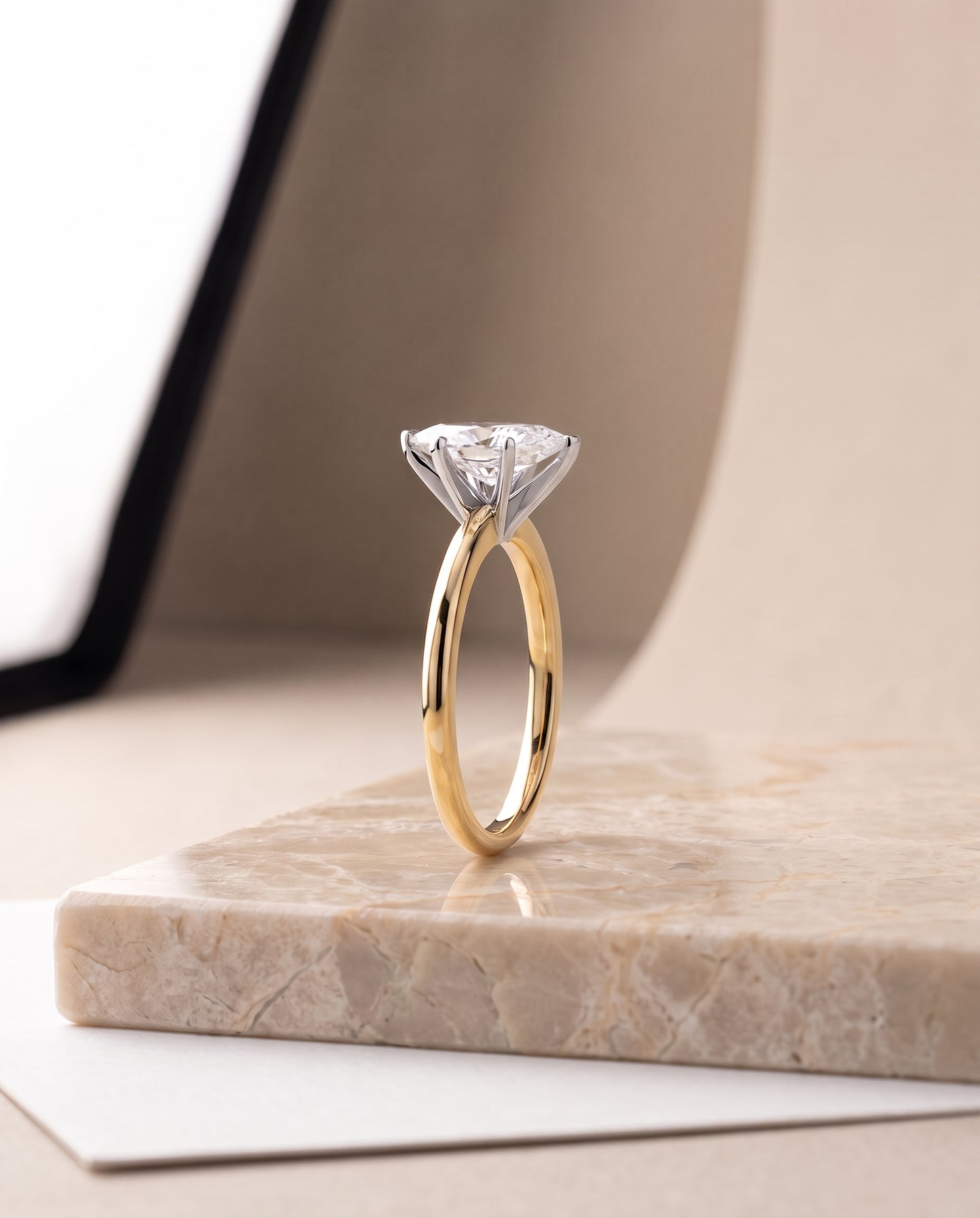 The Floria Comfort Fit Claw Prong Solitaire Marquise Engagement Ring Setting in 18K Yellow Gold