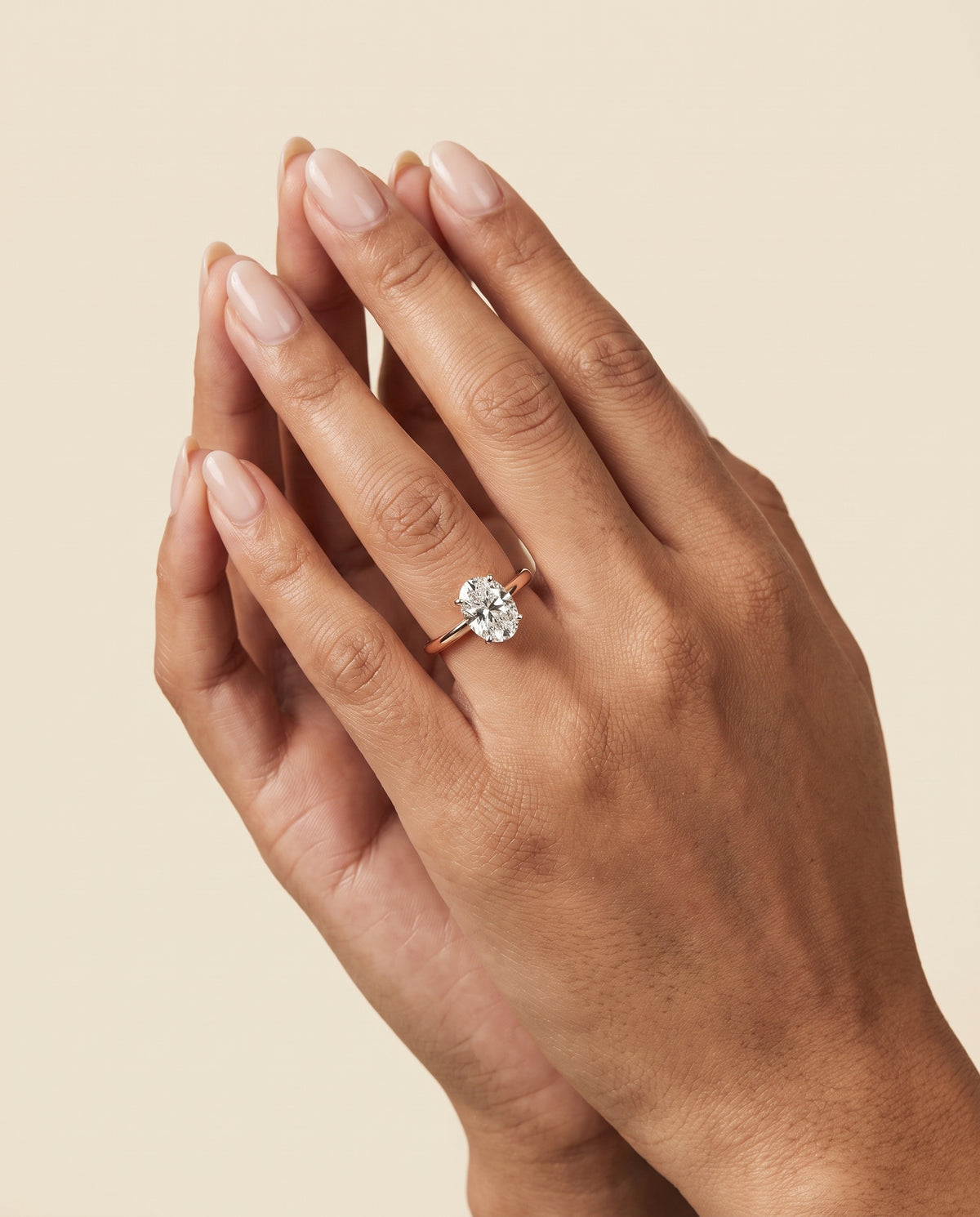 The Floria Comfort Fit Claw Prong Solitaire Oval Engagement Ring Setting in 14K Rose Gold