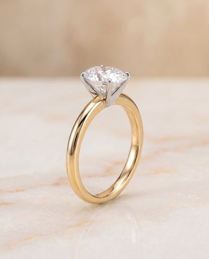 The Floria Comfort Fit Claw Prong Solitaire Oval Engagement Ring Setting in 18K Yellow Gold