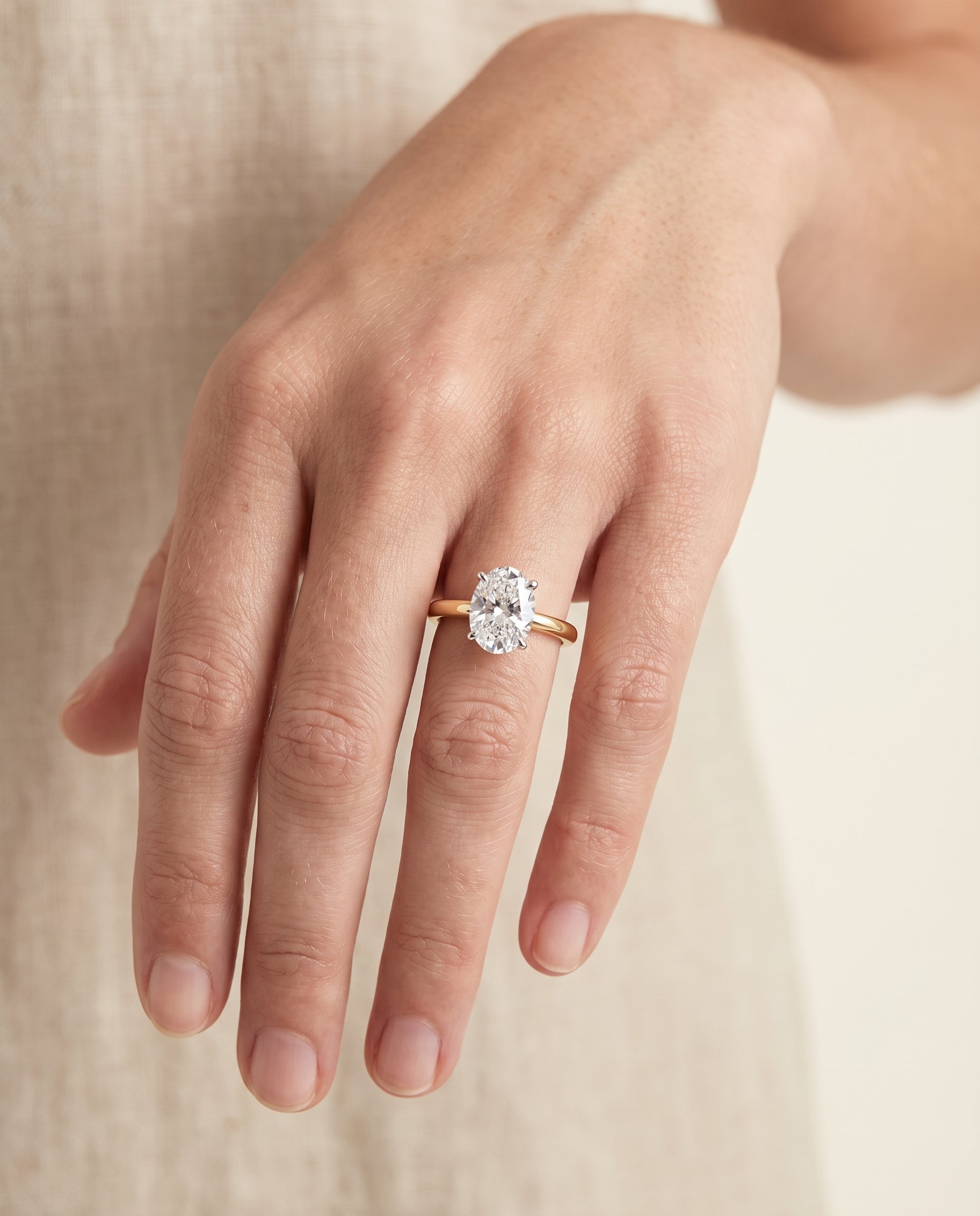 The Floria engagement ring setting in 18K Yellow Gold, comfort fit claw prong solitaire design | RockHer