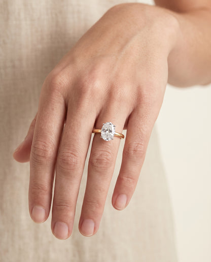 The Floria Comfort Fit Claw Prong Solitaire Oval Engagement Ring Setting in 18K Yellow Gold