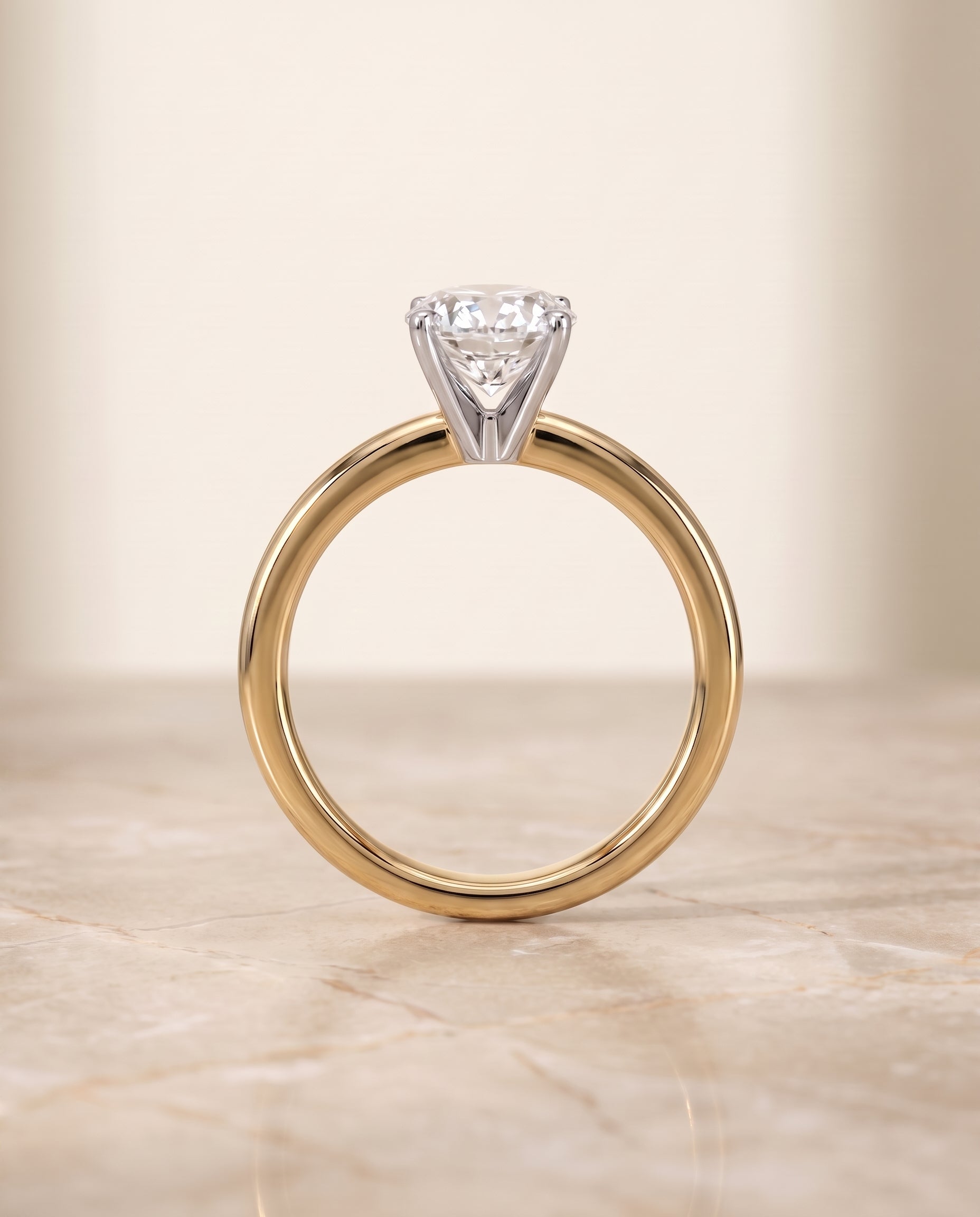The Floria setting for oval diamonds, made to order in 18K Yellow Gold | RockHer