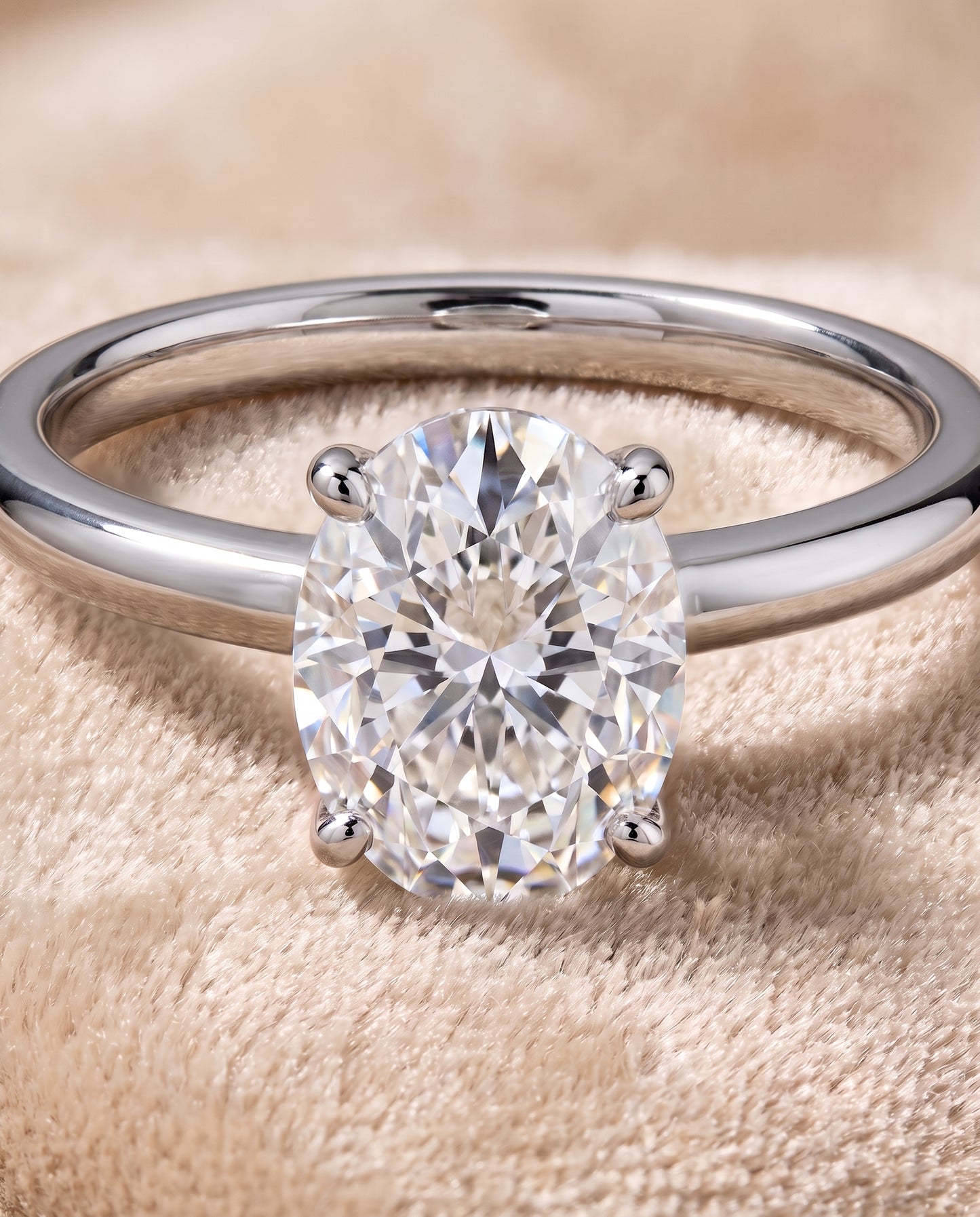 The Floria Comfort Fit Claw Prong Solitaire Oval Engagement Ring Setting in Platinum