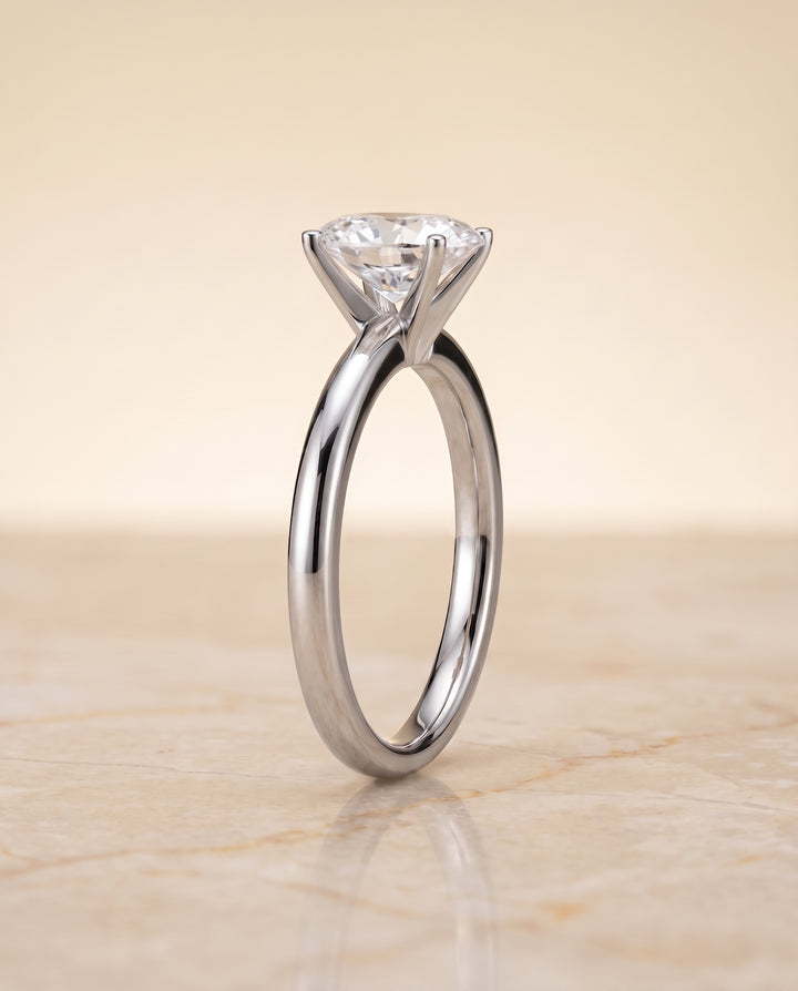 The Floria Comfort Fit Claw Prong Solitaire Oval Engagement Ring Setting in Platinum