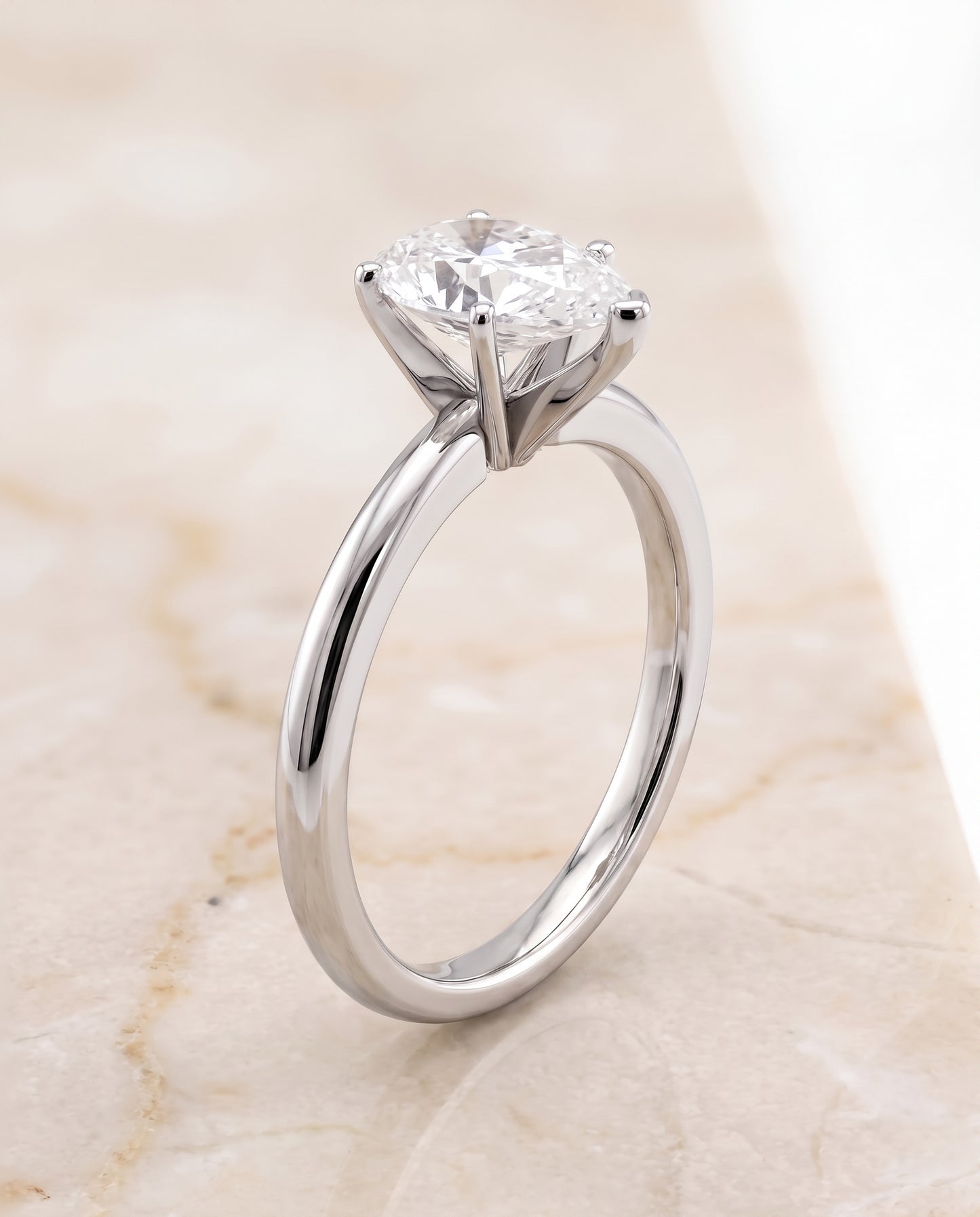 The Floria Comfort Fit Claw Prong Solitaire Pear Engagement Ring Setting in 18K White Gold