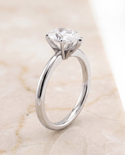 The Floria Comfort Fit Claw Prong Solitaire Pear Engagement Ring Setting in 18K White Gold