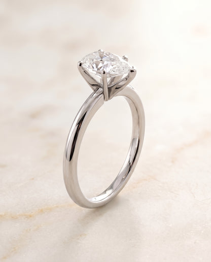 The Floria Comfort Fit Claw Prong Solitaire Pear Engagement Ring Setting in 18K White Gold