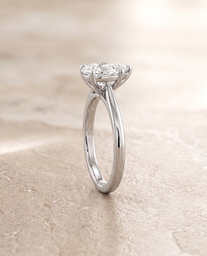 The Floria Comfort Fit Claw Prong Solitaire Pear Engagement Ring Setting in 18K White Gold