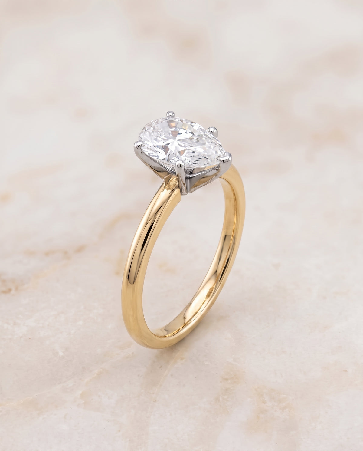 The Floria Comfort Fit Claw Prong Solitaire Pear Engagement Ring Setting in 18K Yellow Gold