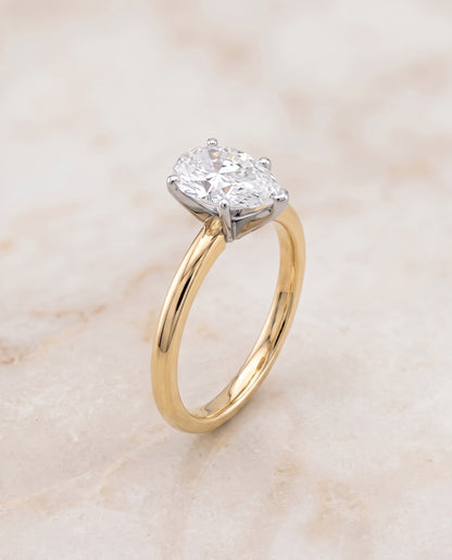 The Floria Comfort Fit Claw Prong Solitaire Pear Engagement Ring Setting in 18K Yellow Gold