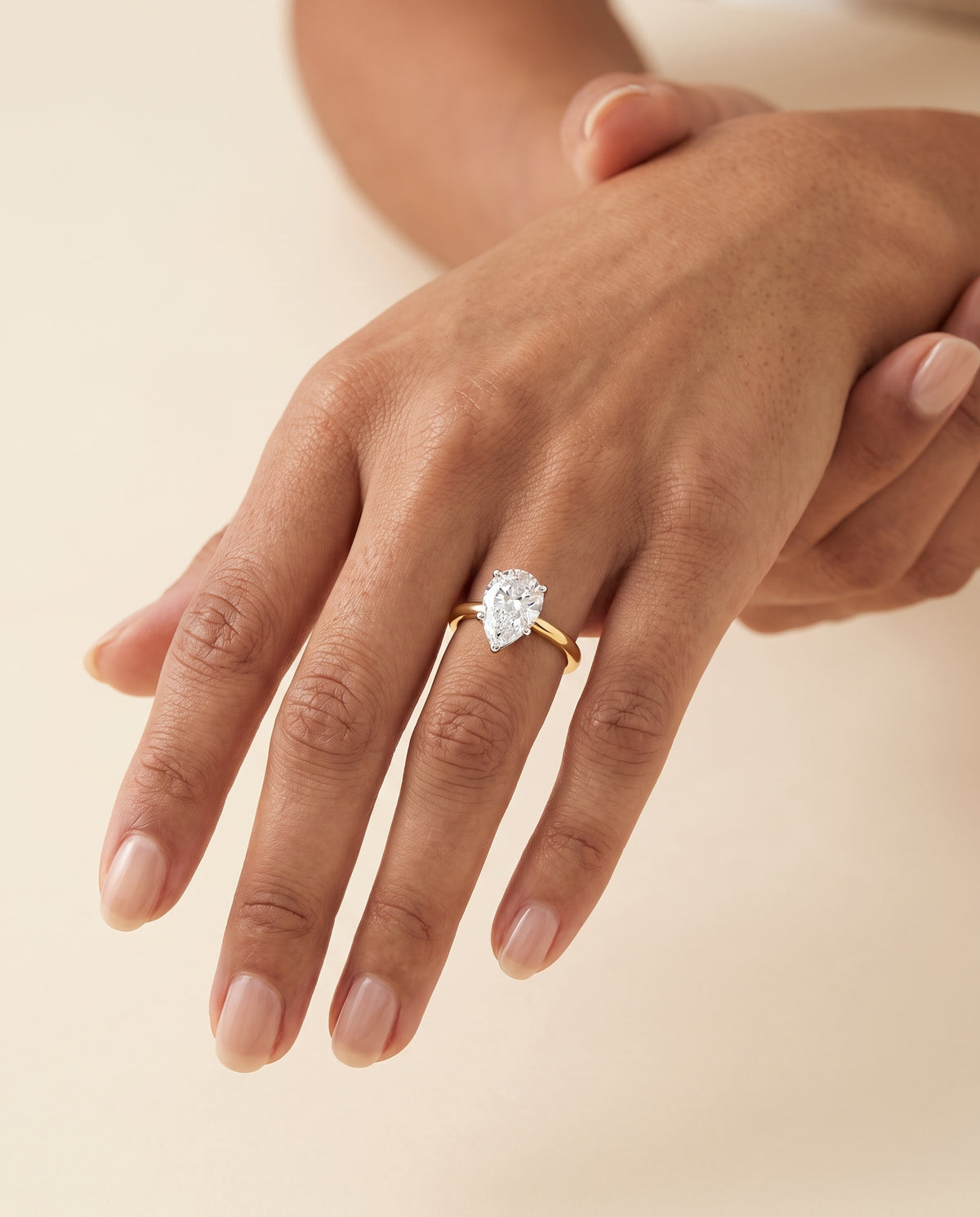 The Floria Comfort Fit Claw Prong Solitaire Pear Engagement Ring Setting in 18K Yellow Gold