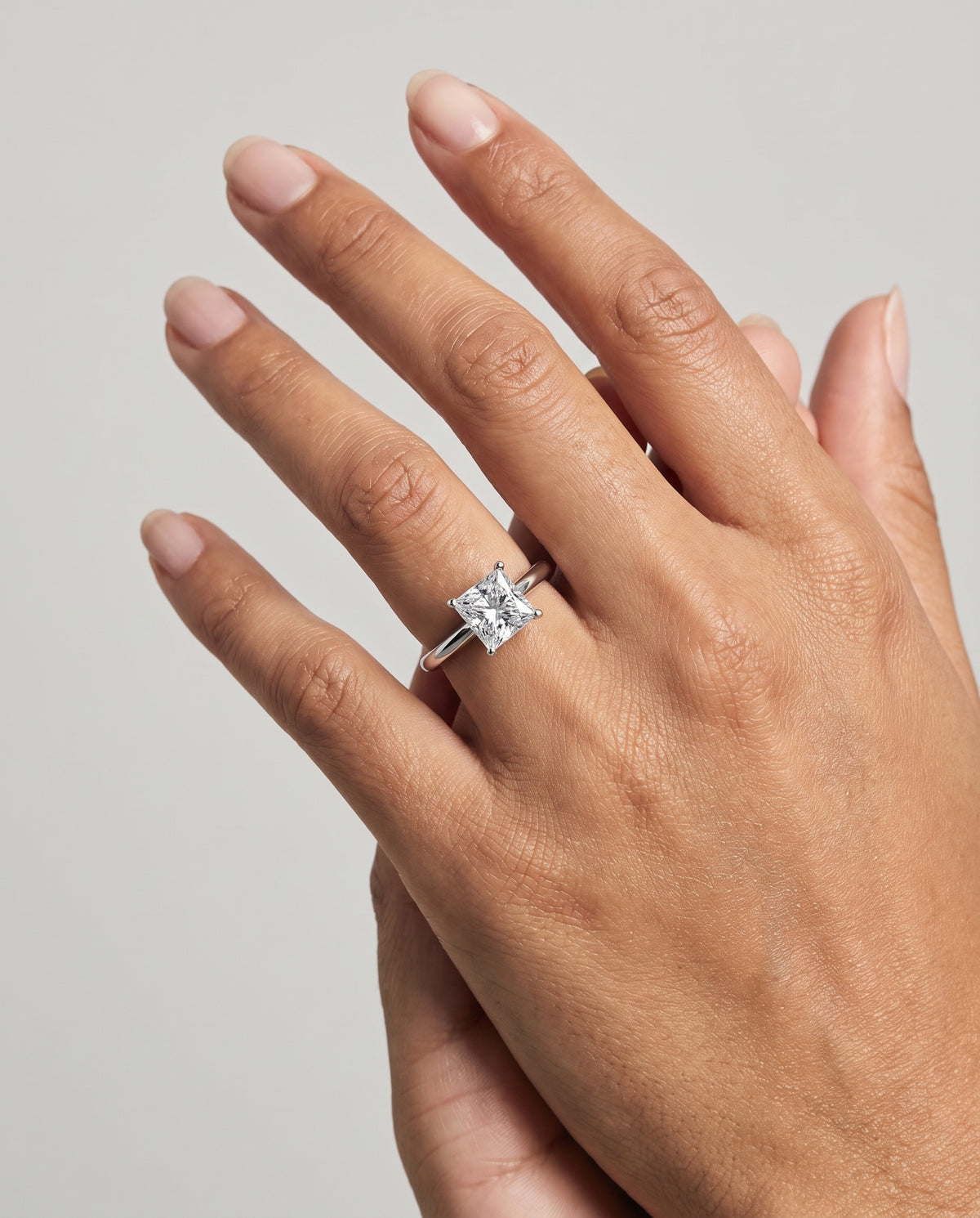 The Floria Comfort Fit Claw Prong Solitaire Princess Cut Engagement Ring Setting in Platinum