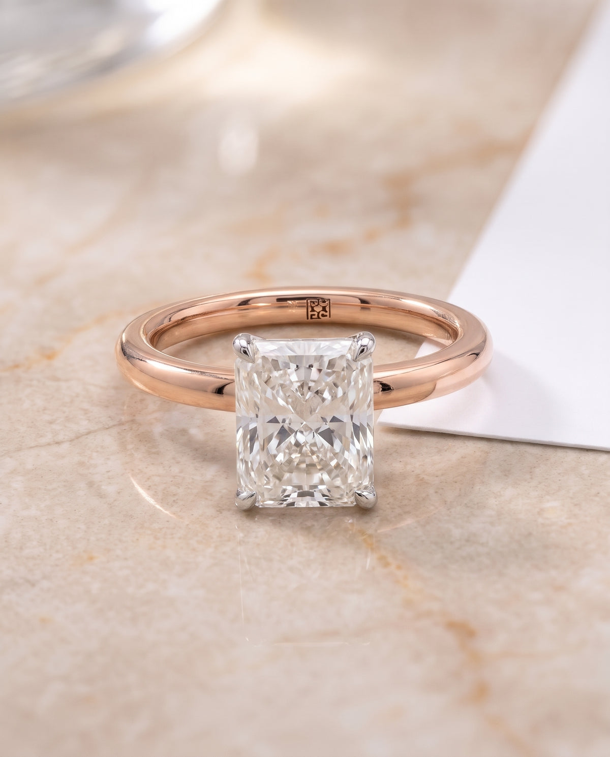 The Floria Comfort Fit Claw Prong Solitaire Radiant Cut Engagement Ring Setting in 14K Rose Gold