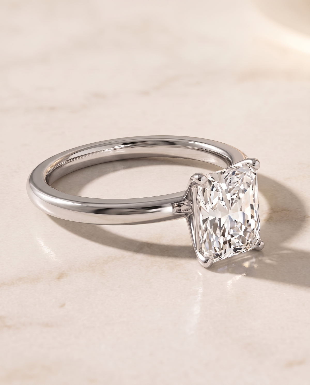 The Floria Comfort Fit Claw Prong Solitaire Radiant Cut Engagement Ring Setting in Platinum